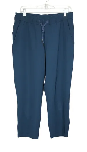 Lululemon Size 8 On the Fly Crop Navy Blue Luxtreme Drawstring Pants thumbnail 1