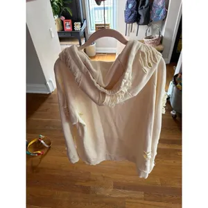 Alo Yoga ivory ripped hoodie‎ sweatshirt featuring distressed detailing large thumbnail 2