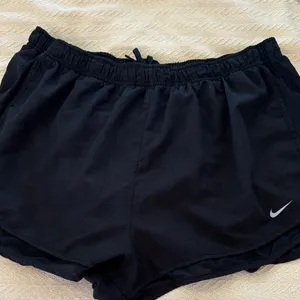 Nike 2X Women's Athletic Black Running Shorts w/ Nike Swoosh drawstring waist thumbnail 1