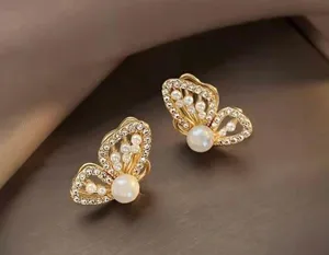 White pearl butterfly stud earrings for women thumbnail 2