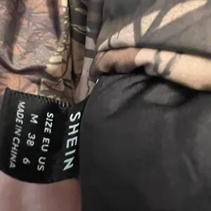 SheIn NWOT Humorology camo puffer jacket thumbnail 4