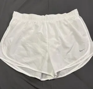Nike Women’s White Athletic Running Shorts with Reflective Swoosh thumbnail 1