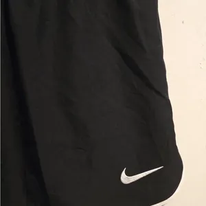 Nike Women's Black Athletic Mesh Shorts with White Trim thumbnail 11