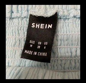 SheIn soft blue high waste skirt with bag - Size Medium thumbnail 2