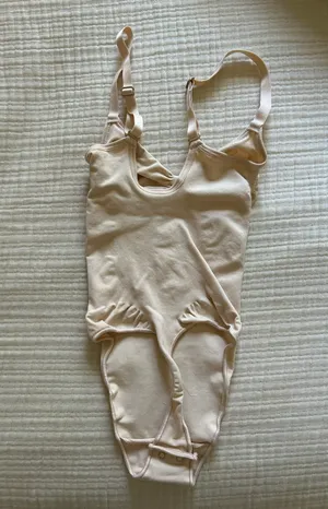 SKIMS Seamless Sculpt Thong Bodysuit in “Sand” thumbnail 2