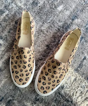 Keds Leopard Print Slip-On Sneakers in Tan, Black & Brown thumbnail 1