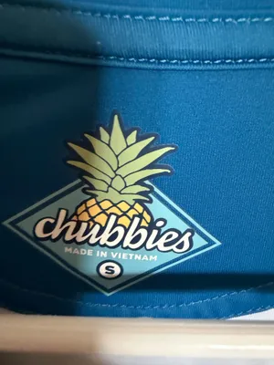 Chubbies Men's Polo Shirt Small Blue Pink Stripe Palm Tree Like New Description: Upgrade your vacation or golf wardrobe with this men's Chubbies performance polo shirt in a vibrant blue. It features an eye-catching neon pink and black abstract stripe with graphic palm trees across the chest, perfect for tropical vibes. it is a men's size small and crafted with premium stretch fabric. This shirt is in excellent, like-new condition with no flaws, fading, or signs of wear Perfect for summer outings, golf days, or casual wear. Ships fast from a smoke-free home! thumbnail 2
