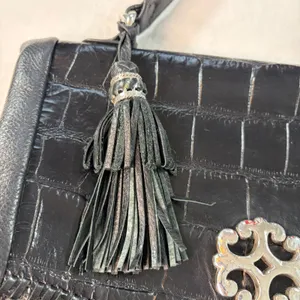 Brighton black leather handbag. 2 pockets with charm, tassel, woven handle thumbnail 5