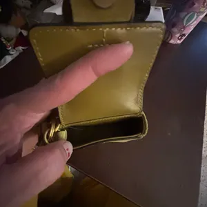 Tory Burch Sawyer mini bag key fob in suede with an oversized buckle and wristle thumbnail 7