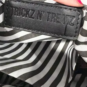 Dolls Kill Trickz N' Treatz Lets Get Lit Faux Shearling Pumpkin Backpack thumbnail 7