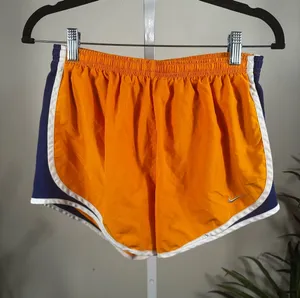 X342. Nike Orange and Navy Athletic Shorts with White Trim thumbnail 1