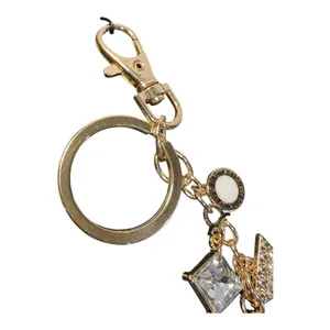 GUESS Los Angeles Gold Tone Logo Charm Keychain – New on Card thumbnail 5