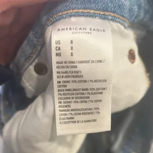 American Eagle Strigid Distressed High Rise Denim Shorts Size 8 thumbnail 4