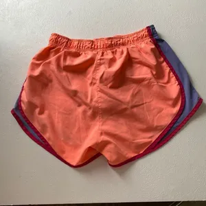Nike Dri-FIT Running Shorts Women’s Small Orange Athletic Gym Activewear Lightwe thumbnail 2