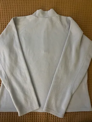 light blue north face woman’s quarter zip turtle neck vest in a size L thumbnail 4