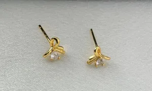 Small CZ Bow Stud Earrings for Women Gold thumbnail 4