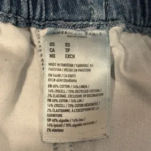 American Eagle Outfitters Women's Ruffle Denim Shorts thumbnail 7