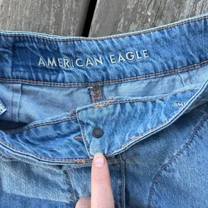 American Eagle size 2 denim mini skirt‎ button detail pockets thumbnail 3