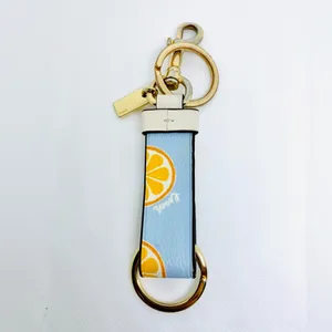 Coach Loop Bag Charm With Lemon Print And Key Ring Blue And Gold thumbnail 2