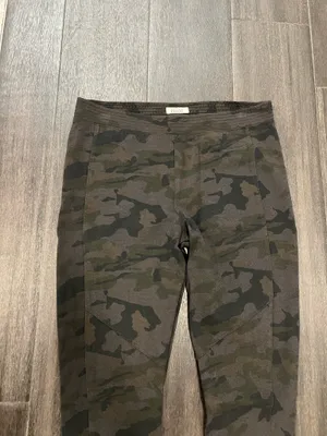 Soft black camo leggings with a smooth finish. Elastic waistband for a snug fit. Simple versatile style for everyday wear. Mudd. Size large. 65% rayon, 30% nylon, 5% spandex thumbnail 3