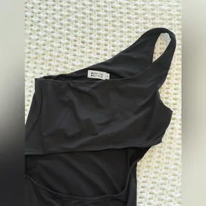 Beginning Boutique Elegant Black Maxi Dress with cut out and slit thumbnail 2