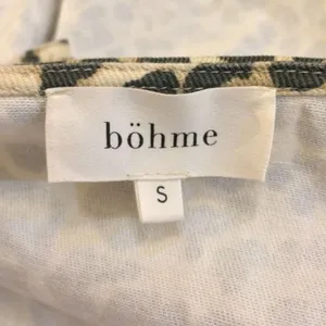 Bohme Tori Peplum mini dress in leopard small thumbnail 7