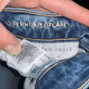 American Eagle medium wash size 2 distressed Flare jeans thumbnail 2