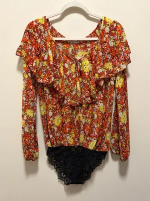 Free People Floral Ruffle Long-Sleeve Bodysuit in Orange and Yellow thumbnail 1
