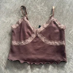 Divided H&M cropped ribbed tank top with lace trim. Color- brown. Size small thumbnail 1