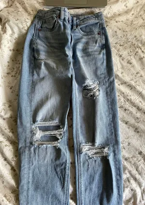 American Eagle Ripped Light Wash Mom Jeans thumbnail 1