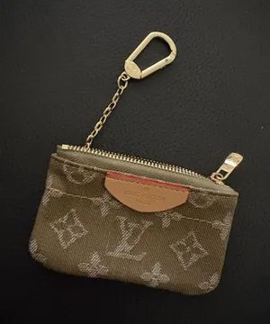 embroiled wrislet coin bag Brown thumbnail 1