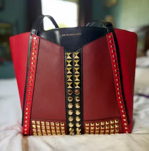 Red Black and Gold Studded Michael Kors Purse. Large. thumbnail 1