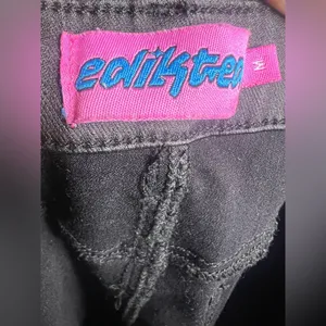 EDIKTED Luna Faux Leather Flare Leg Black Pants in size Medium. thumbnail 7