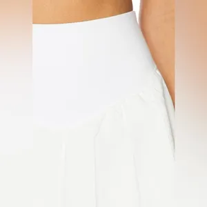 NWT FREE PEOPLE MOVEMENT SWING OF THINGS PLEATED SKORT WHITE sz Xs thumbnail 2