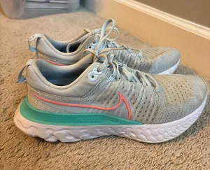 Nike Women’s Athletic Shoes - Light Blue with Coral and Mint Accents thumbnail 1