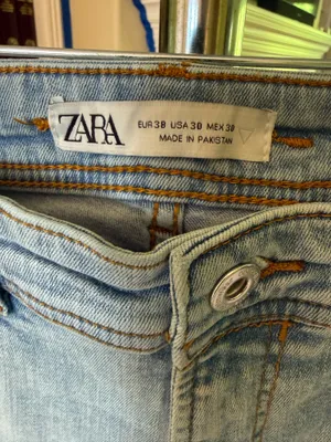 Zara light wash distressed skinny jeans thumbnail 4