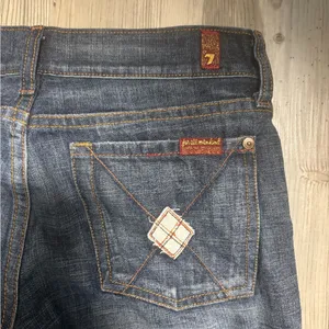 7 For All Man Kind Dark wash flare jeans with a 27”waist and 30" inseam #flares thumbnail 3