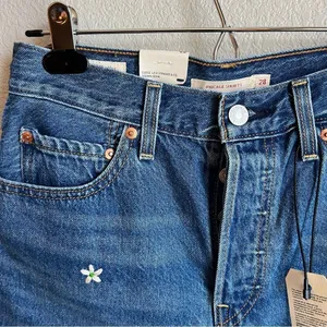 Levi’s Ribcage Medium Wash High Rise Embroidered Cutoff Denim Shorts thumbnail 5