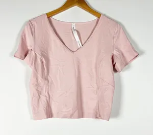 Lululemon Women's Nulu Cropped Slim Yoga Short Sleeve Tee Shirt Pink Mist 12 thumbnail 1