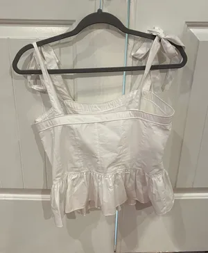 Olivaceous White Peplum Top With Bows thumbnail 1