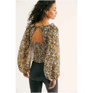 Free People Mabel blouse features a sheer floral print with balloon sleeves F53 thumbnail 2