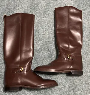 Brown knee high brown leather boots with buckle detail. Worn 1x. Mint condition! thumbnail 1