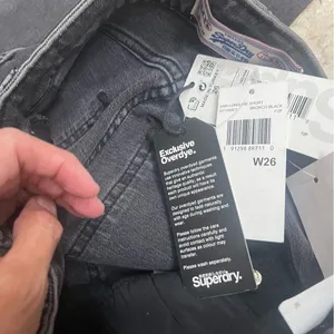 NWT Superdry Cut Off Denim Jean Kari‎ Longline Shorts 26 Coastline Black shorts thumbnail 3
