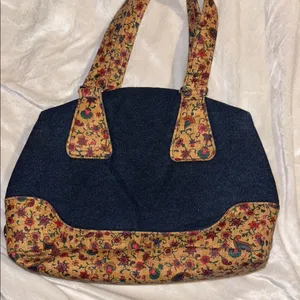 Blue Denim Handbag With Floral Corklike Design On Bottom & Handles Red Interior thumbnail 1