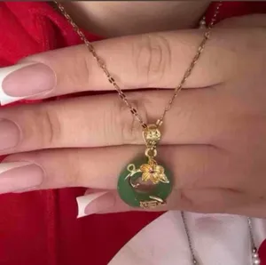 Brand New Green jade pendant with gold floral design and a small red gemstone 18 K gold plated thumbnail 1