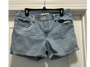 Levi’s Women's Denim Jean Shorts Size 32 Mid Length Zip Fly Cuffed Light Wash thumbnail 1