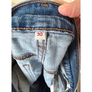Levi's Denim Shorts Women 30 Medium Wash‎ Raw Hem Cut Off 29965-0008 thumbnail 4
