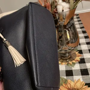 Nine West The Natala Tote features a top zip closure, interior pockets, and shoulder strap thumbnail 10