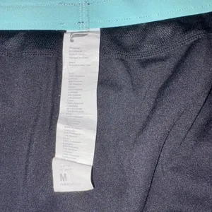 Fabletics Abstract Breathe Mid Rise Running Shorts thumbnail 8