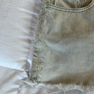 Levi's 501 cut off denim shorts with floral embroidery. Size 34 (?) thumbnail 2